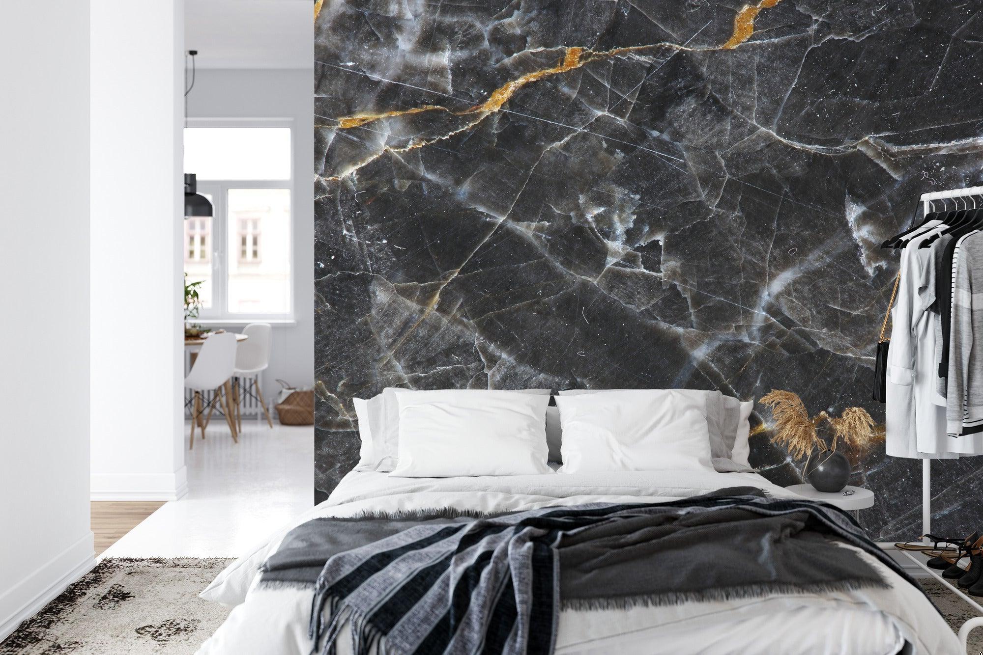 Luxury marble wall mural transforming a master bathroom with gold fixtures
