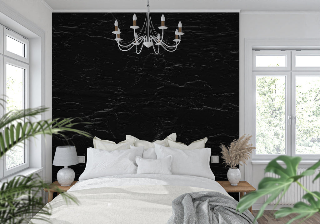 Elegant dining room featuring black stone wall mural with subtle grey streaks