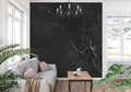 Black marble wallpaper with white veins in modern living room setting
