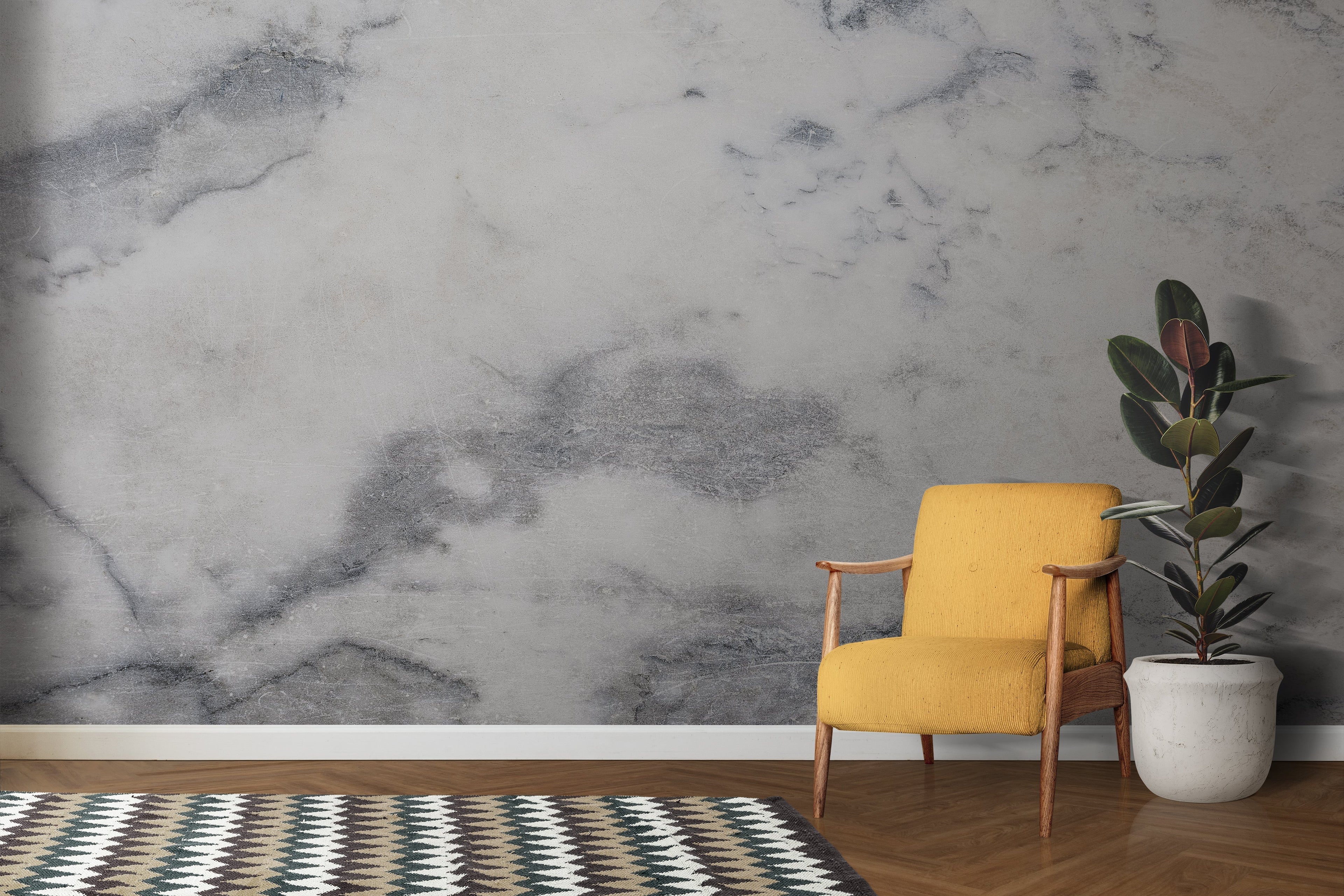 Grey marble effect wallpaper adding luxury to a minimalist bedroom