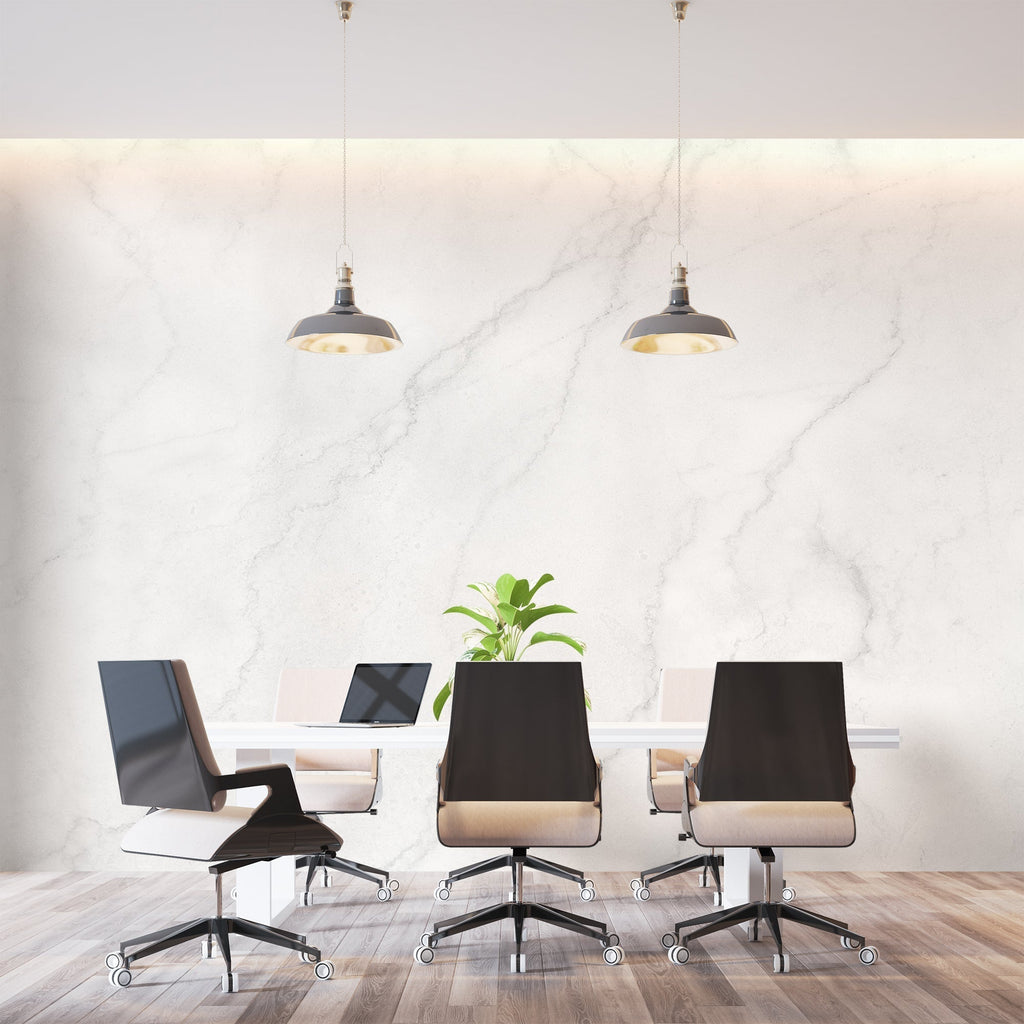 White and grey veined marble wallpaper displayed in bright dining room space