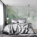 Green and gold marble wallpaper in modern living room creating luxurious atmosphere