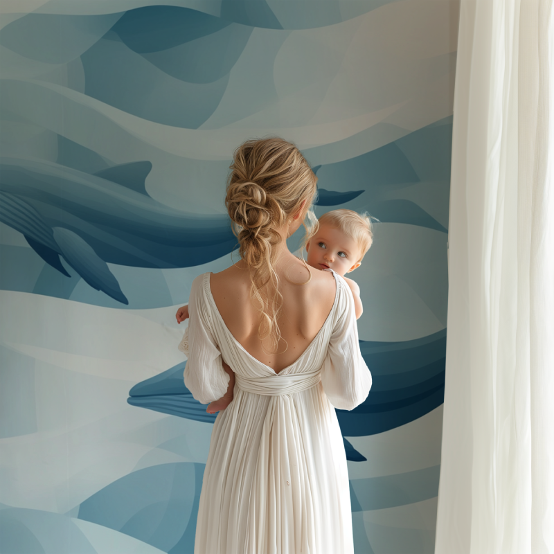 Whale mural wallpaper transforming a playroom with its calming blue tones and cloud designs