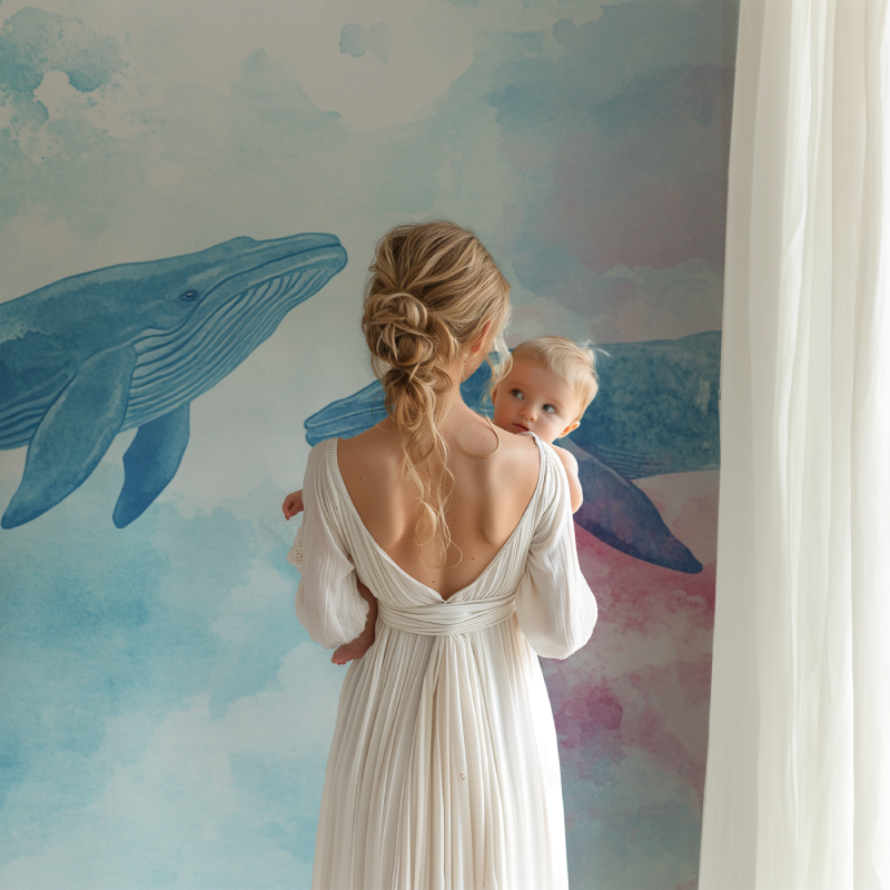 Whale wallpaper mural creating a peaceful atmosphere in a children's bedroom