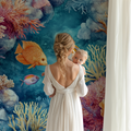 Coral reef wallpaper mural bringing underwater magic to a modern living room with blue accents