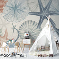 Marine life wallpaper creating a peaceful atmosphere in a modern bathroom with soft coral and seashell designs