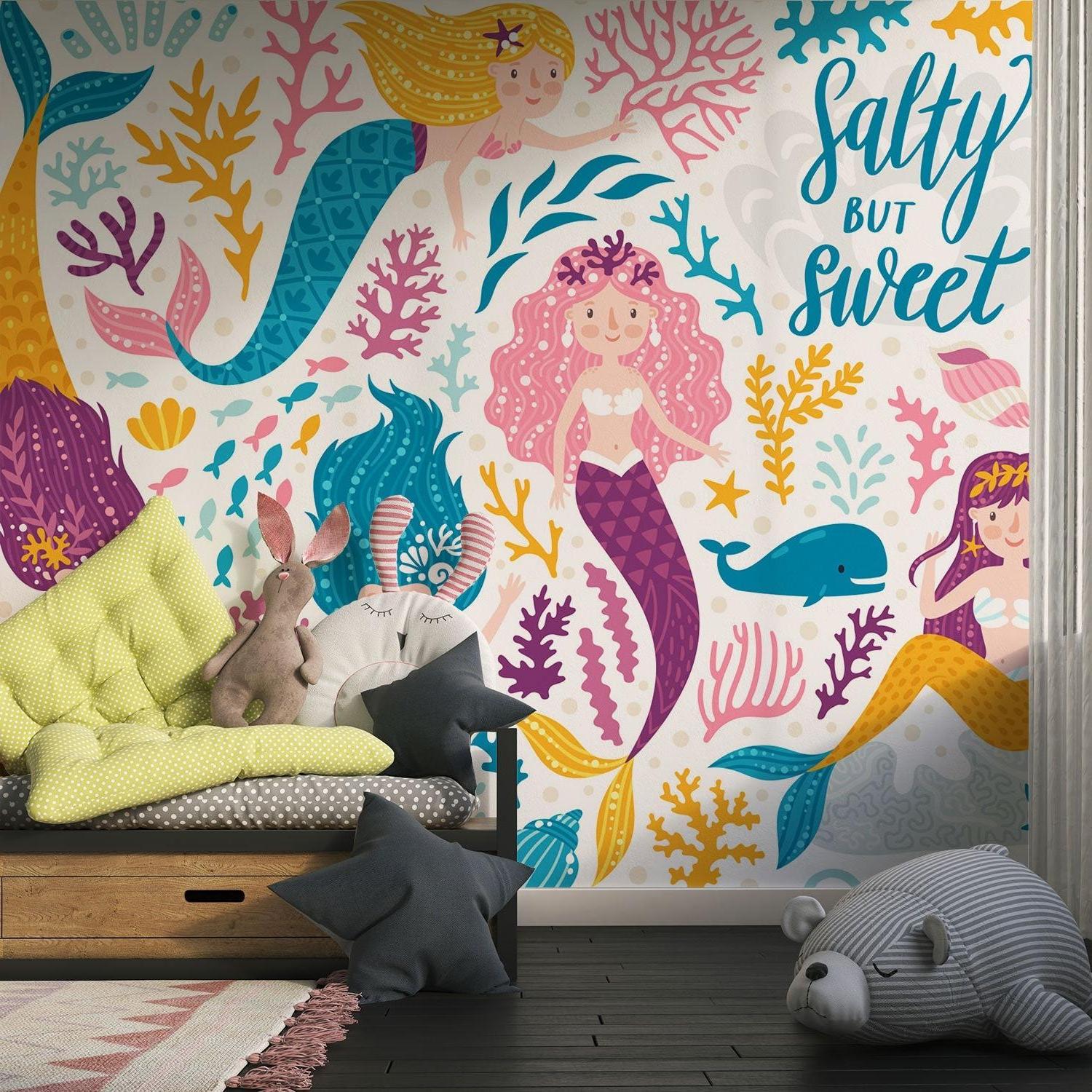Mermaid wall design adding charm to a nautical nursery setup
