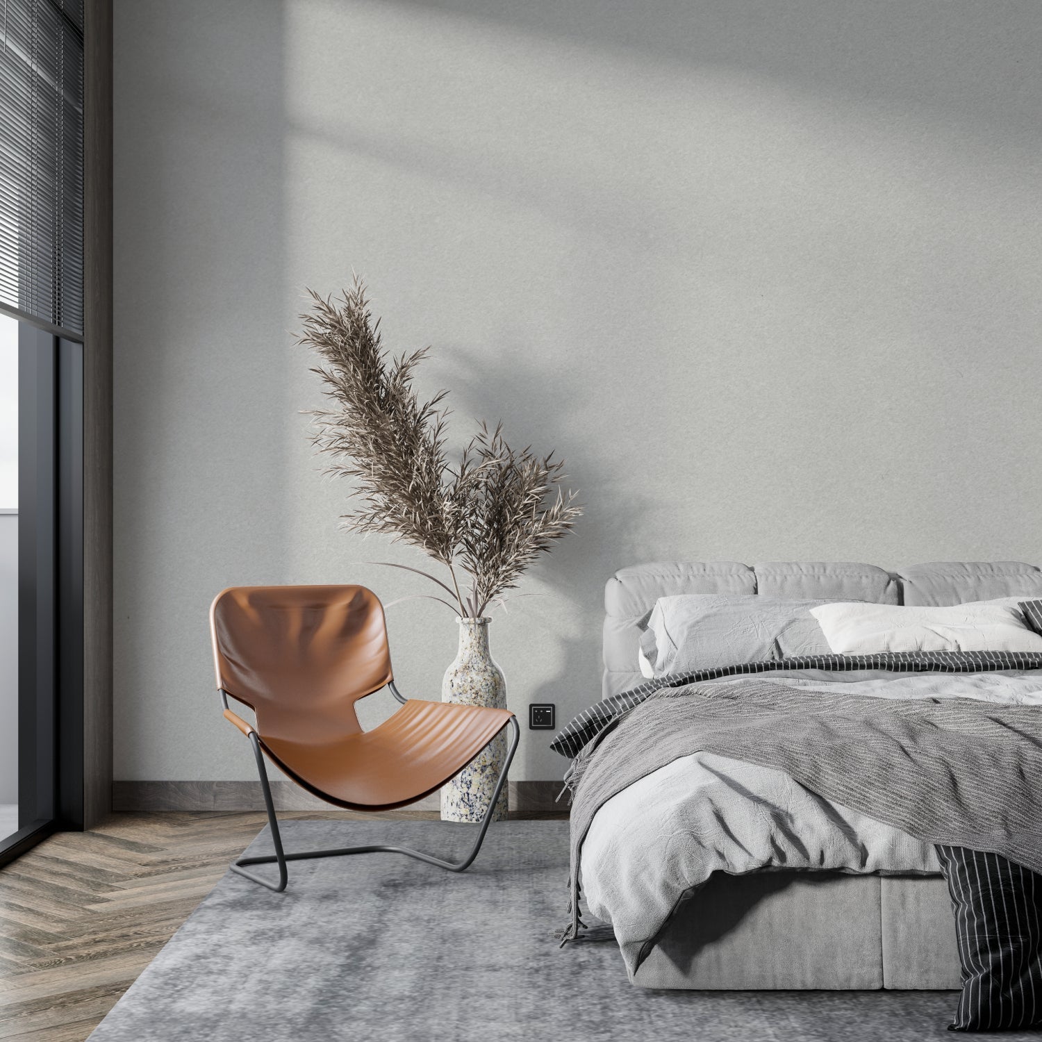 Modern grey wallpaper in a bright living room setting with minimal furniture and natural light