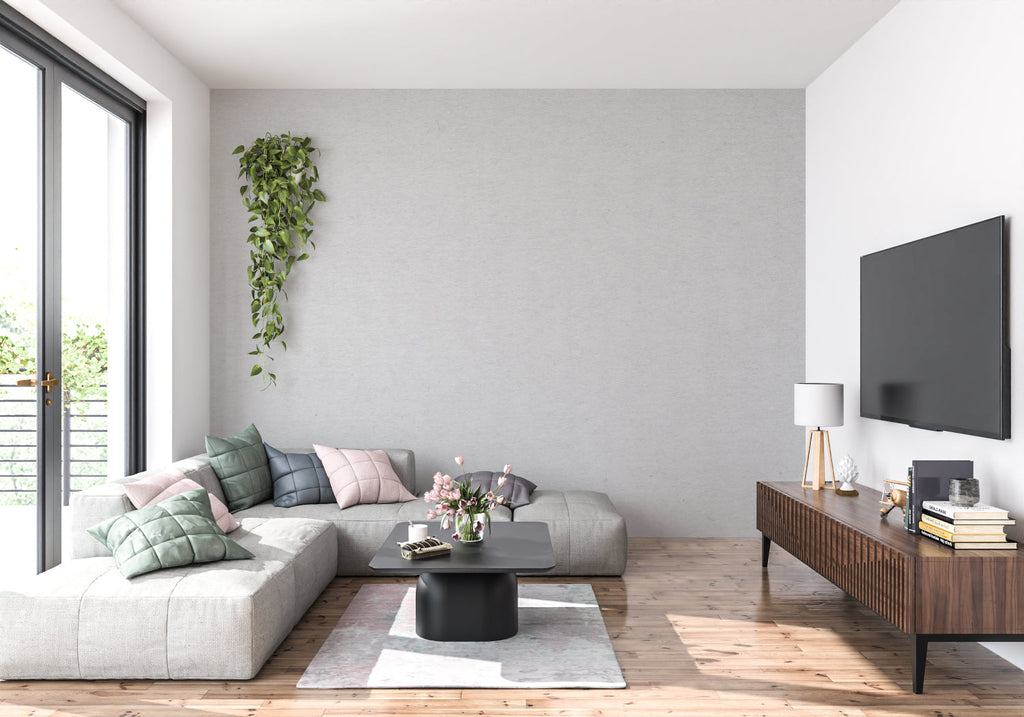 Modern grey minimalist wallpaper in bright living room with contemporary furniture