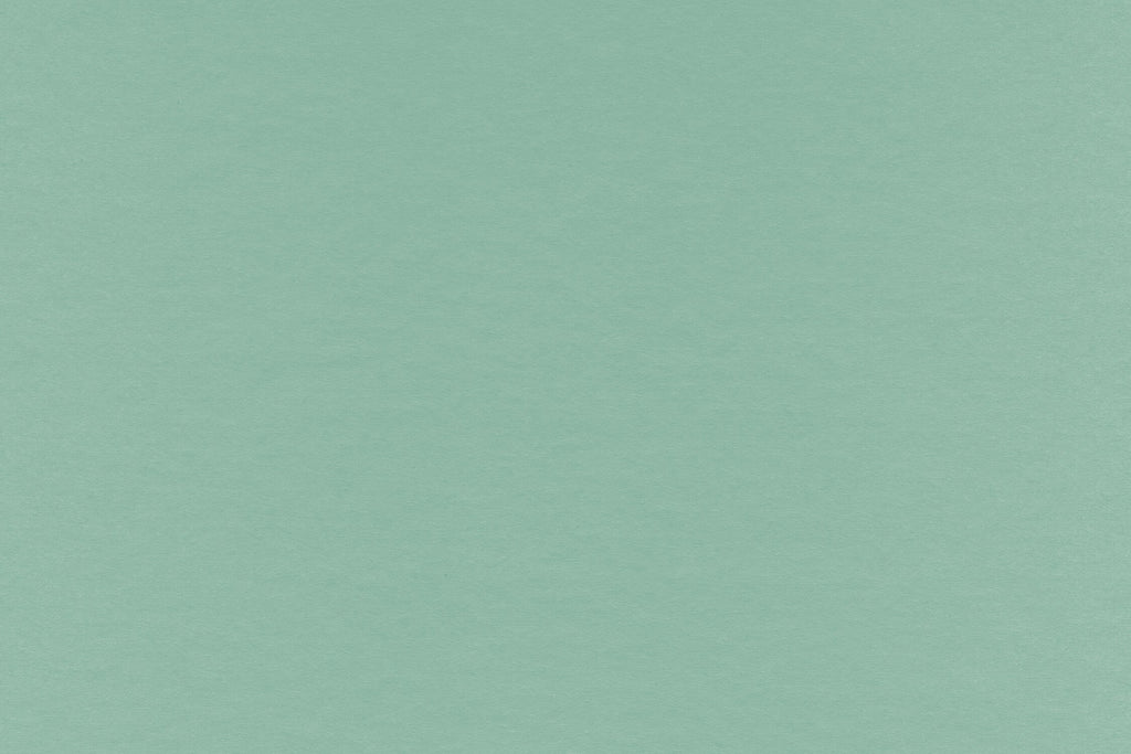 Design file of mint green wallpaper showing exact color and texture