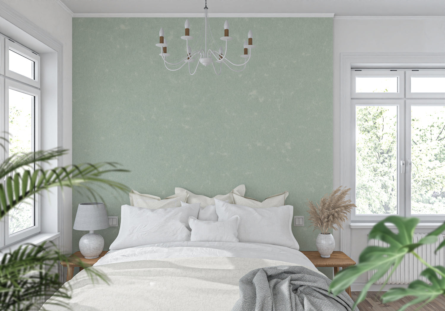 Mint green wall covering in a dining room showcasing its versatility with different furniture styles