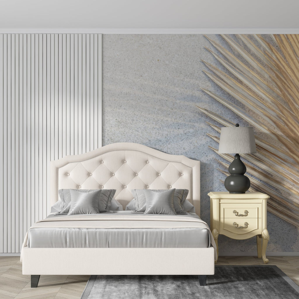 Contemporary circular wall design featuring gold palm leaf in a home office