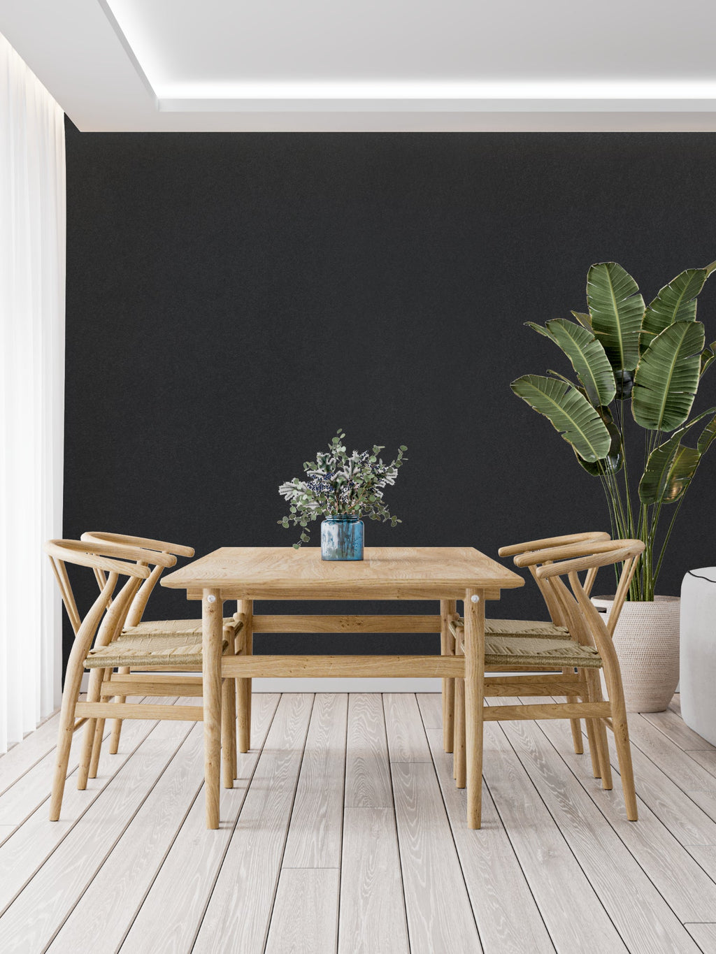 Modern grey wall design in a dining room with statement lighting
