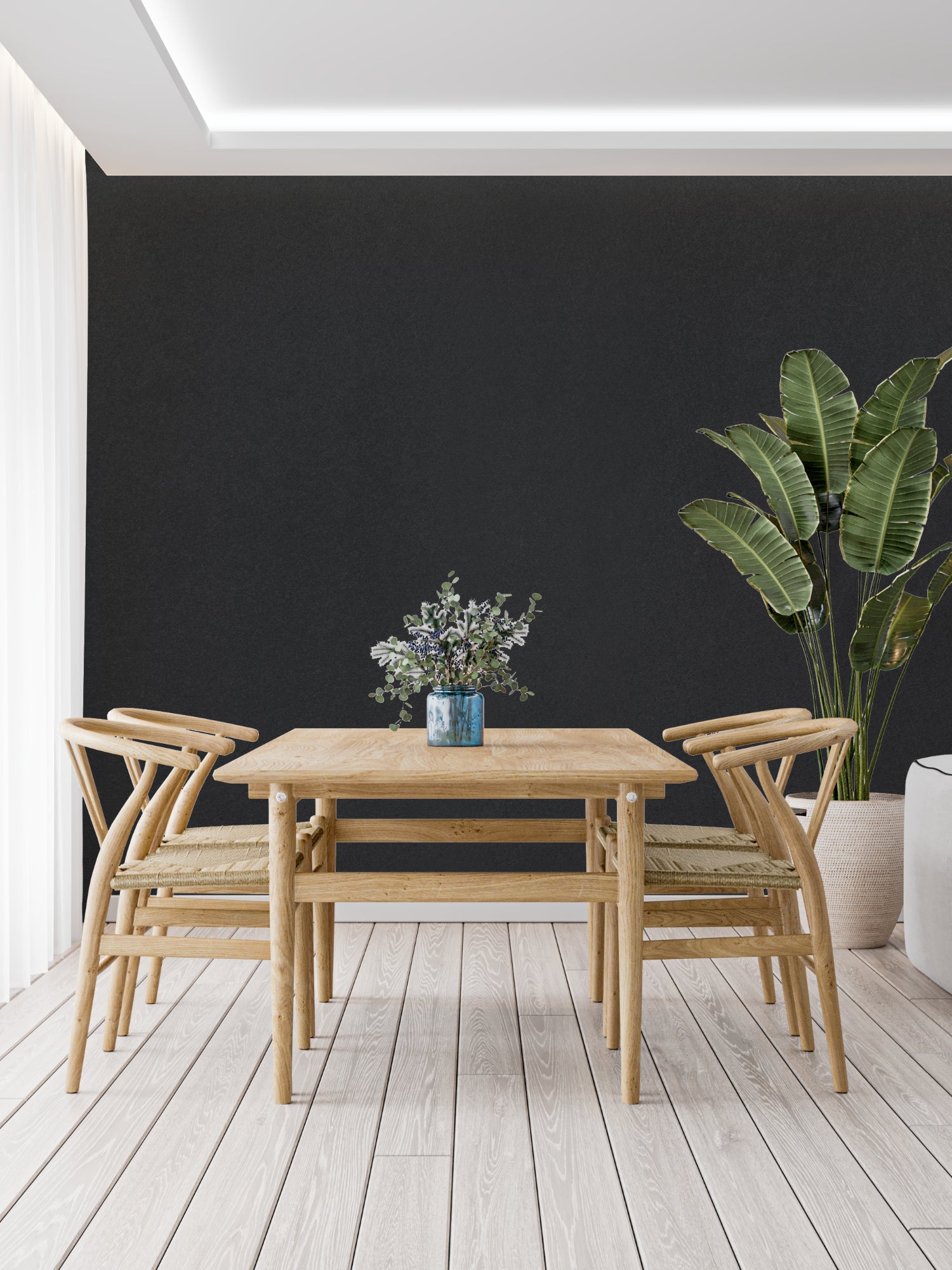 Modern grey wall design in a dining room with statement lighting