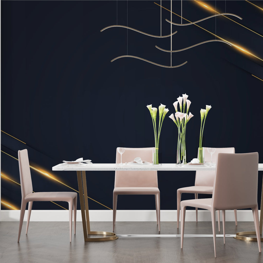 Navy and gold geometric wallpaper in modern living room with grey sofa and natural light