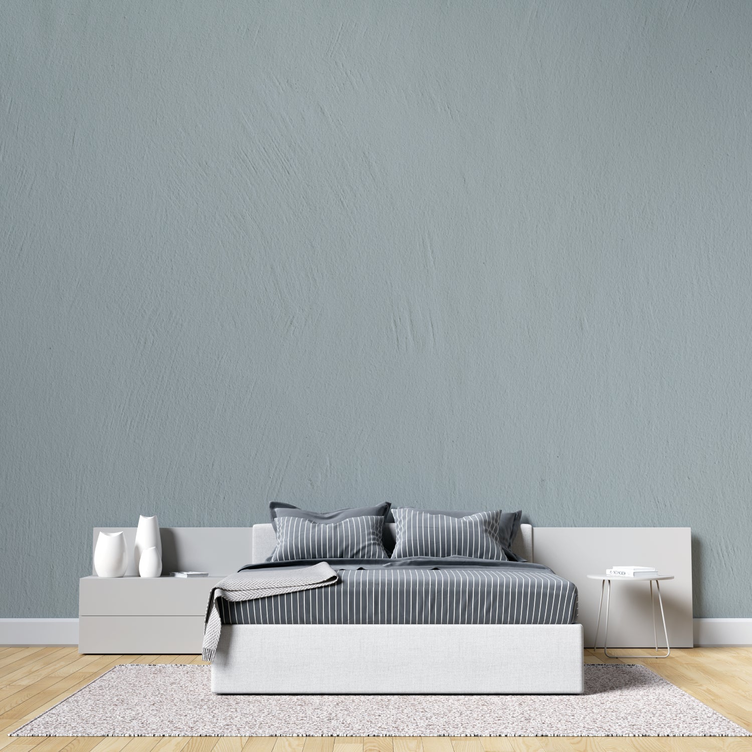 Sage green textured wallpaper in modern living room with natural light highlighting subtle pattern