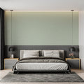 Sage green textured wallpaper in a modern living room with natural light streaming through windows