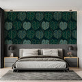 Monstera leaf wallpaper in modern living room showing green and gold pattern catching natural light