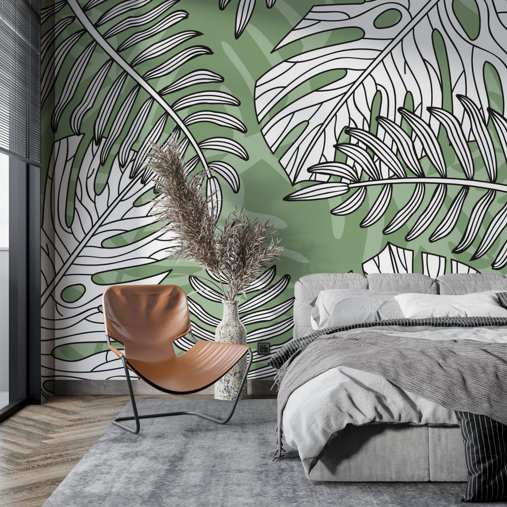 Bedroom wall with minimalist Monstera leaf pattern creating a peaceful space