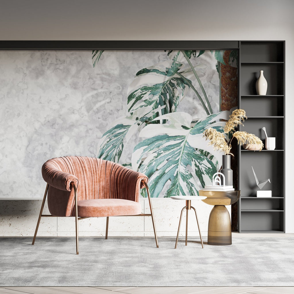 Dining room showcasing green Monstera wallpaper with sophisticated marble details