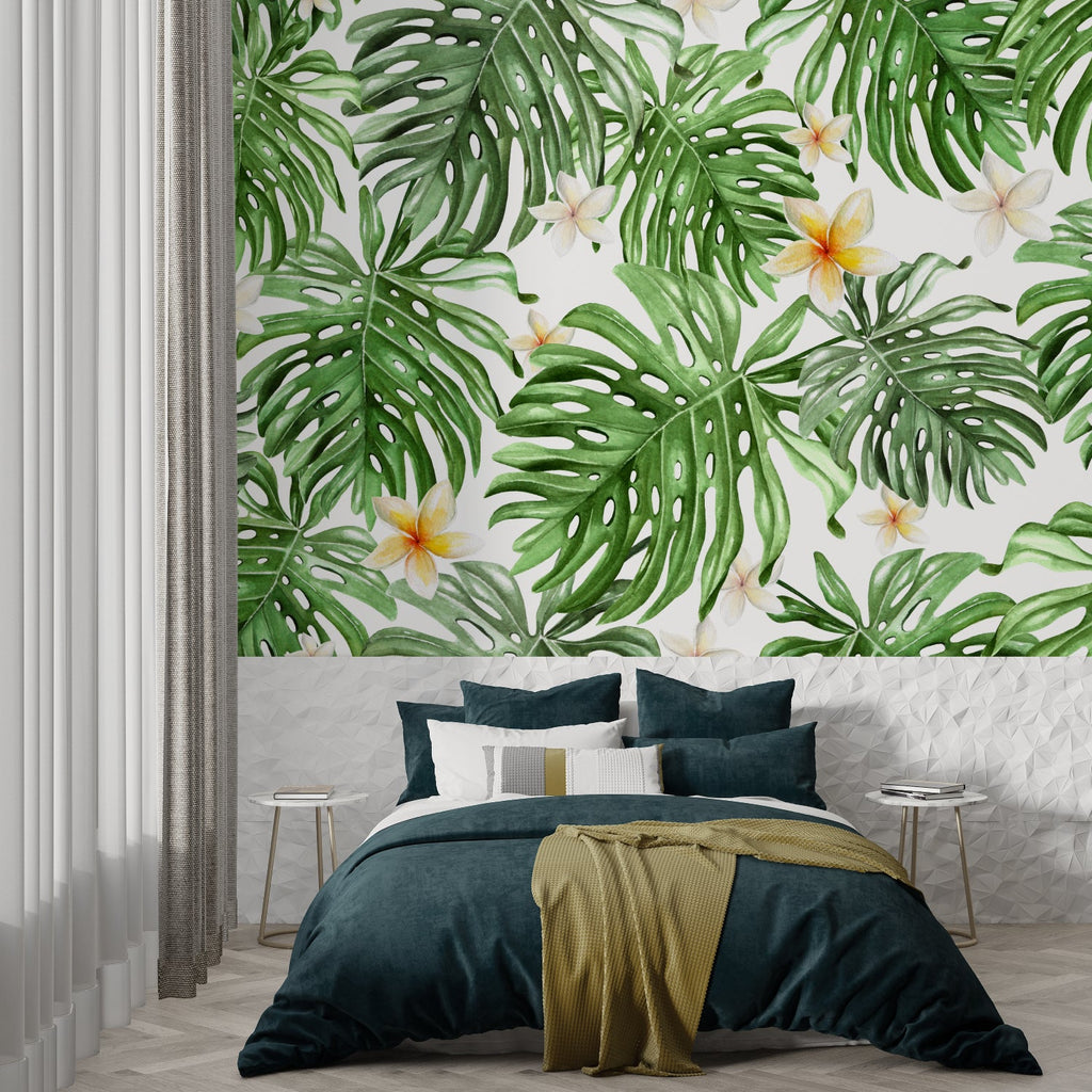 Monstera leaf wallpaper creating a fresh atmosphere in a modern living room with natural light