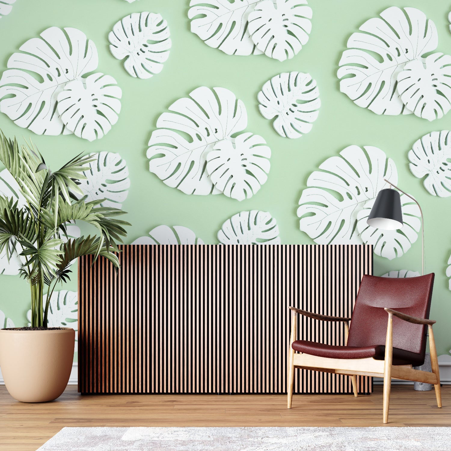Home office with white Monstera leaf wallpaper adding a clean, professional touch