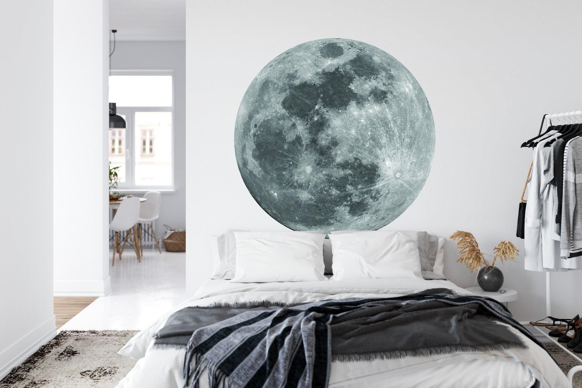 Celestial moon mural in minimalist living room adds depth and character