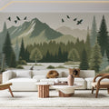 Mountain forest wallpaper with deer creating a cozy atmosphere in a modern living room with natural light