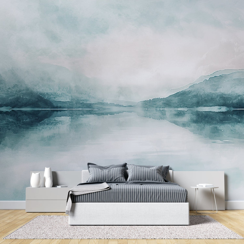 Serene bedroom with mountain lake mural wallpaper behind bed