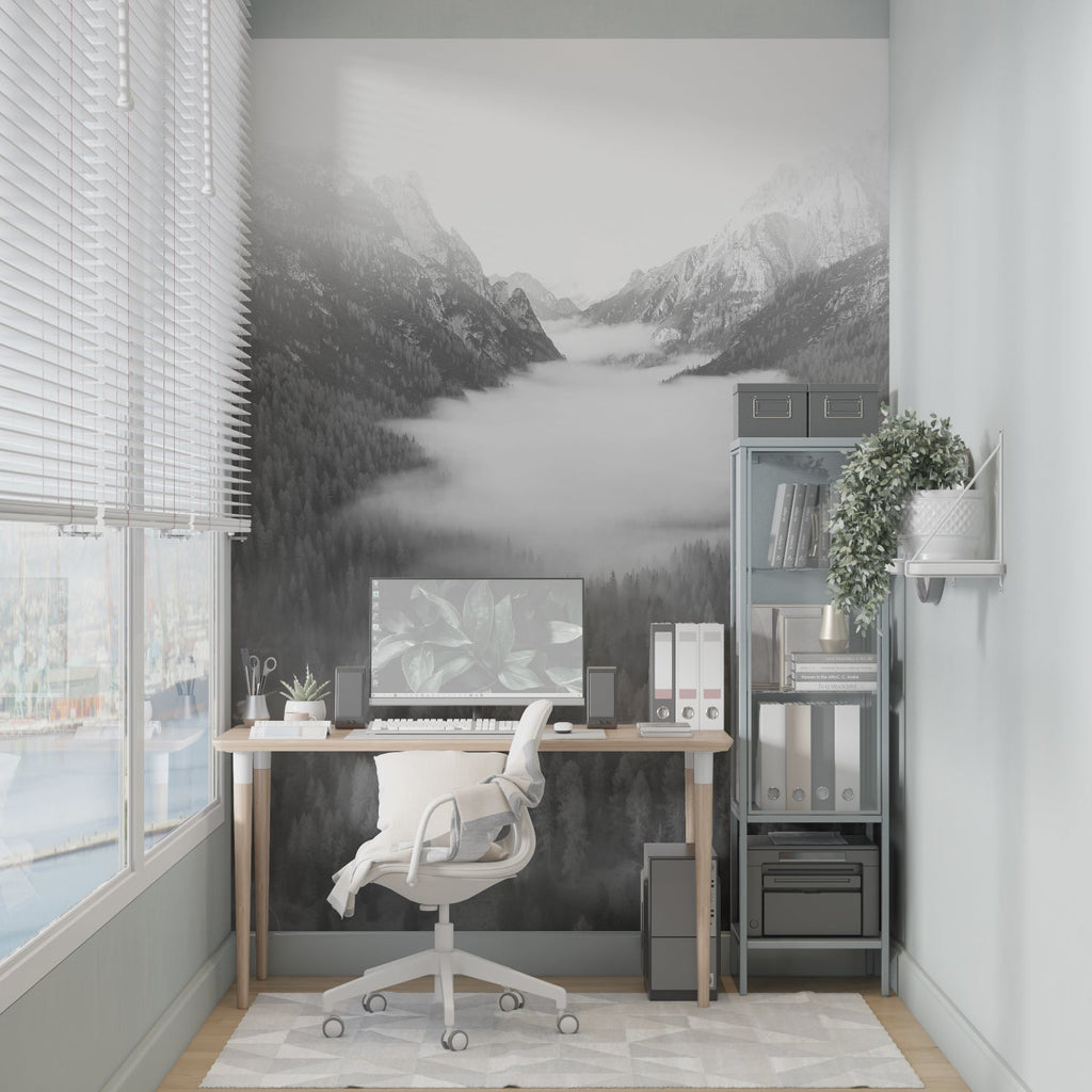 Mountain mist wallpaper in modern living room with grey sofa and natural light
