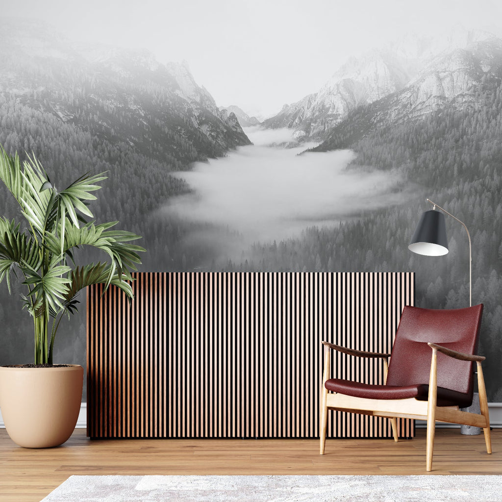 Black and white mountain mural in minimalist bedroom with wooden furniture