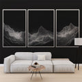 Modern mountain line art wallpaper creating depth in a minimalist living room with clean furniture and natural light