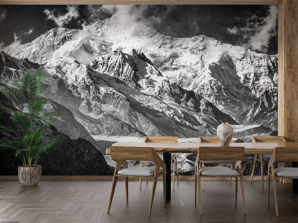 Black and white mountain mural in minimalist bedroom with wooden accents