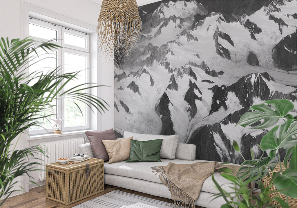 Black and white mountain wallpaper making statement in master bedroom