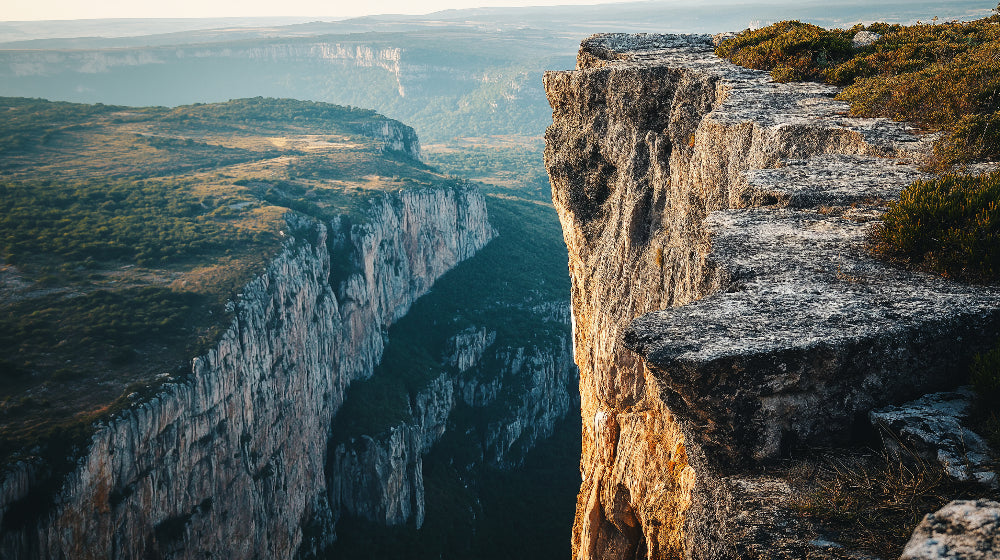 Mountain landscape wallpaper design file showing detailed cliff formations and panoramic vista