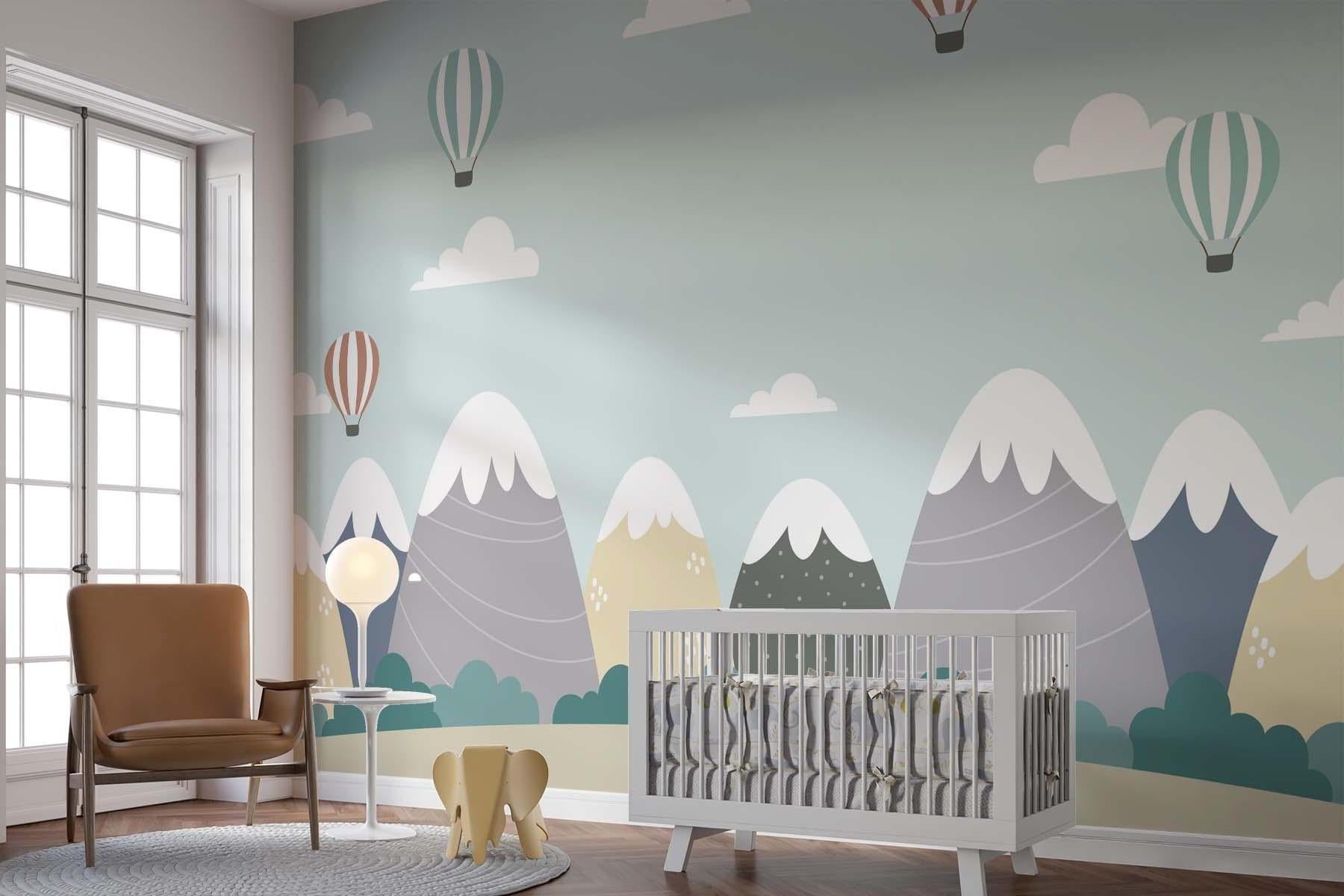 Playroom wall decorated with mountain landscape and hot air balloon mural