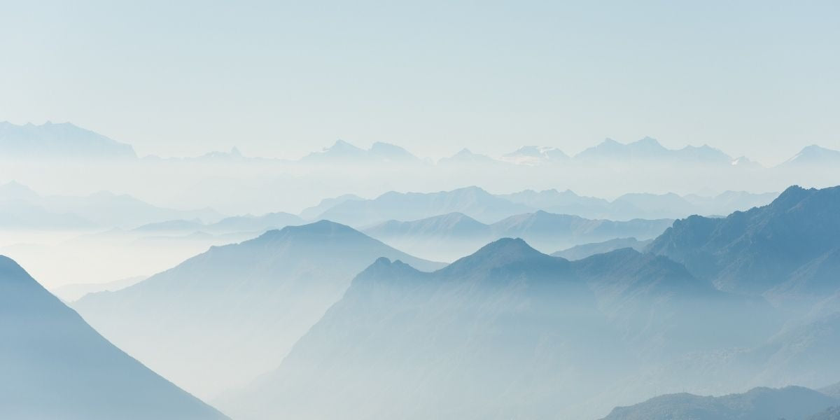 Mountain landscape wallpaper design file showing detailed misty peaks pattern