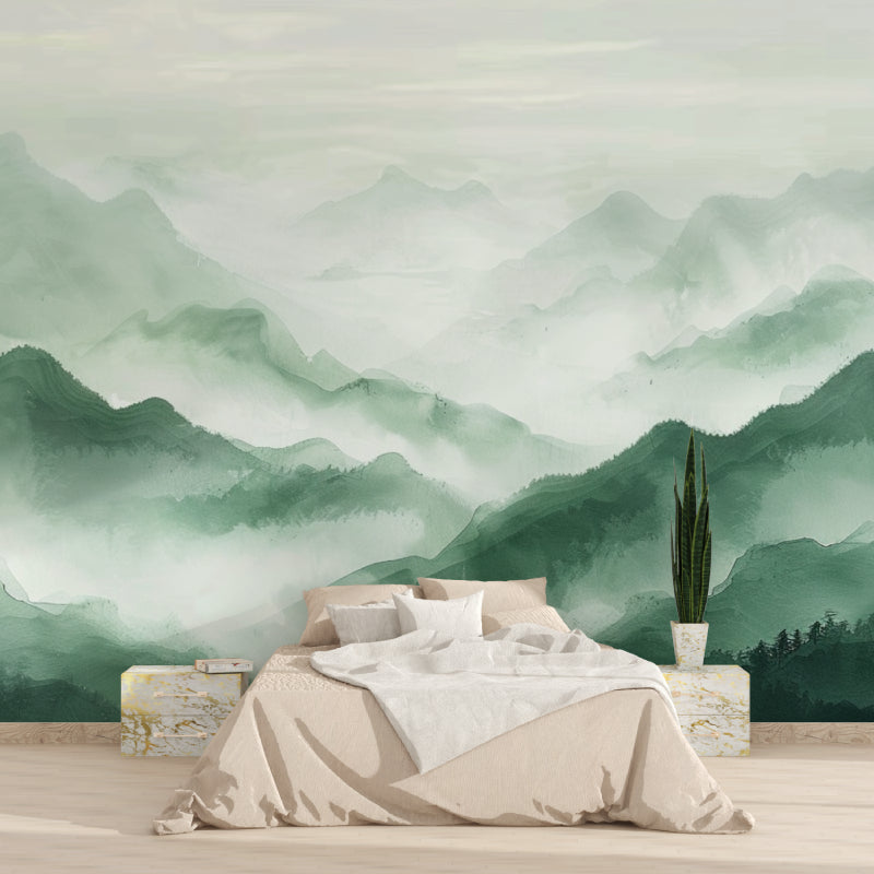 Green mountain mural adding depth to a dining room with soft lighting