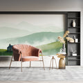 Mountain landscape wallpaper creating depth in a modern living room with natural light