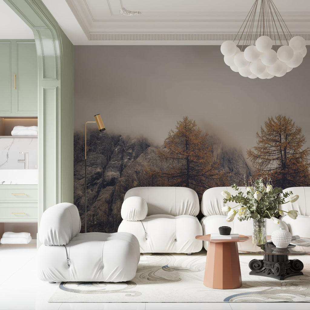 Mountain landscape wallpaper creating depth in modern living room with grey sofa and natural decor