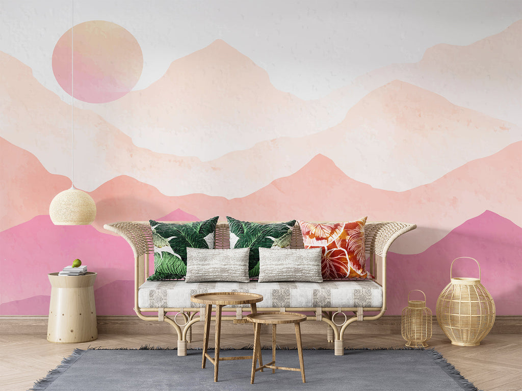 Mountain range wallpaper adding depth to a dining room with pink sunset hues