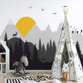 Mountain landscape wallpaper with yellow sun in modern Scandinavian living room, showing clean lines and natural light