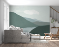 Mountain landscape wallpaper creating depth in modern living room with minimal furniture