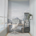 Mountain wall mural in modern living room showing scale of snowy peaks design