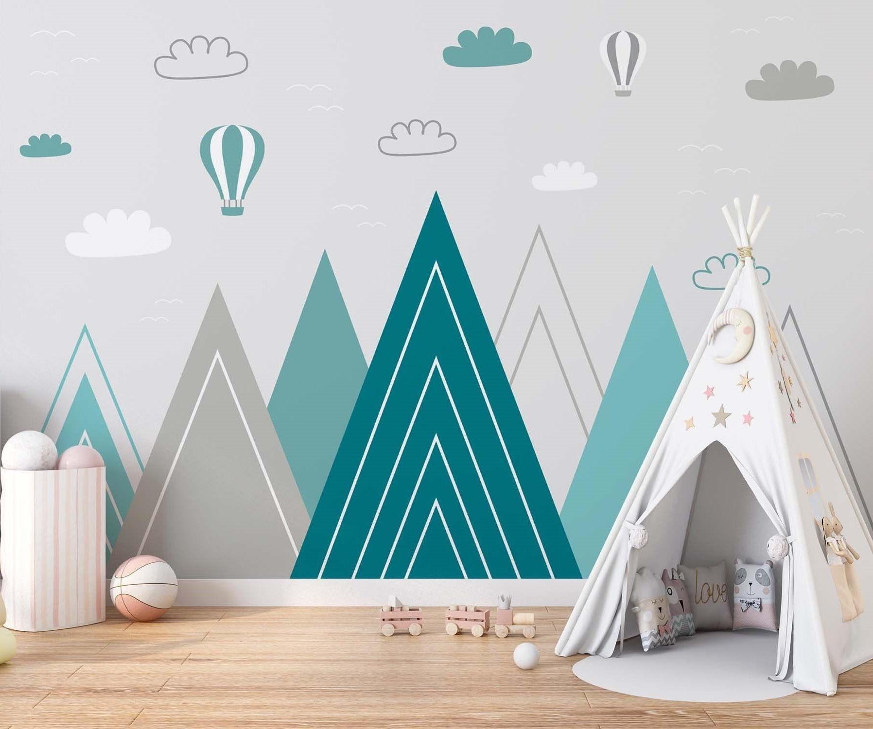Geometric mountain wallpaper featuring hot air balloons in a contemporary children's bedroom