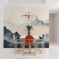 Mountain mural wallpaper in modern living room, creating serene atmosphere with watercolor peaks