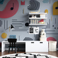 Modern music note wallpaper in bright teen bedroom showing coral and turquoise geometric pattern