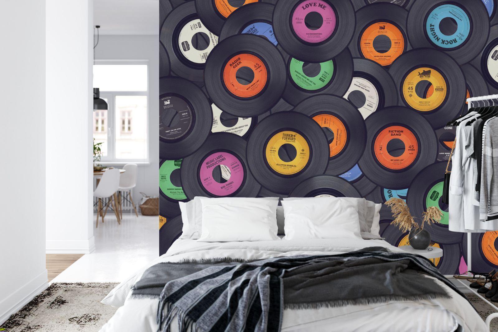 Vinyl record wallpaper creating a dynamic backdrop in a modern living room with leather sofa and ambient lighting