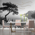 Black and white mountain lake wallpaper creating depth in modern living room with minimal furniture