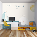 Nautical whale wallpaper in a cozy kids bedroom with soft lighting and marine-themed decor